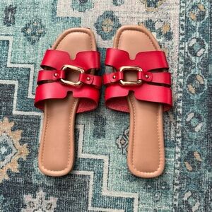 Red Flat Sandals with Gold Hardware
